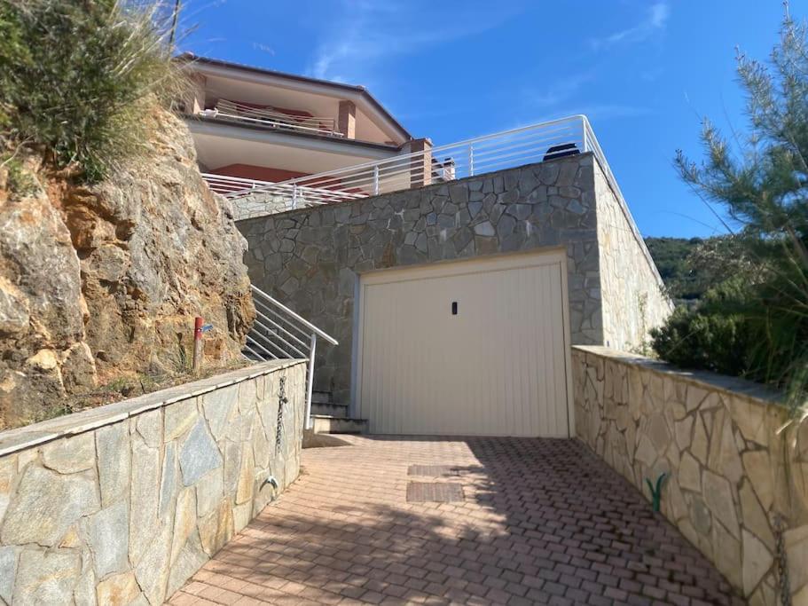 Luxury Beach House Порто Санто Стефано Экстерьер фото