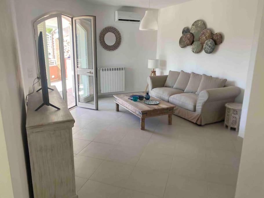 Luxury Beach House Порто Санто Стефано Экстерьер фото